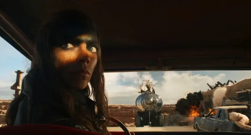 Anya Taylor-Joy looking over her shoulder in the film Furiosa